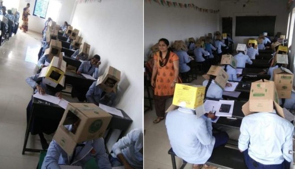 Estudantes fazem prova com caixa de papelão na cabeça para não ‘colar’ na prova