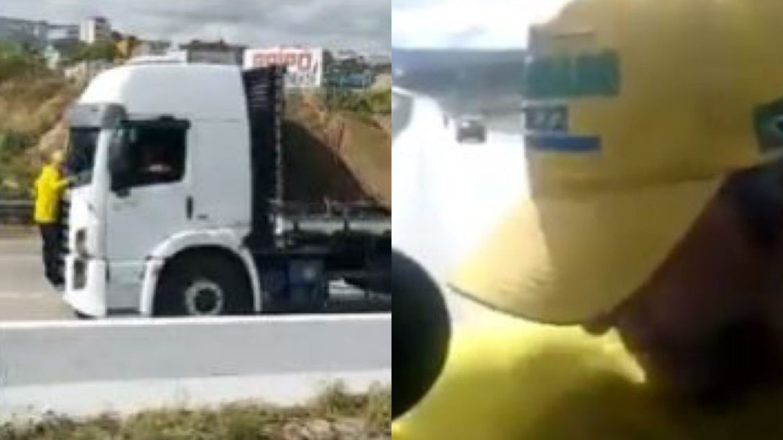 Vídeo: Bolsonarista tenta impedir passagem de caminhão e é levado em para-brisas
